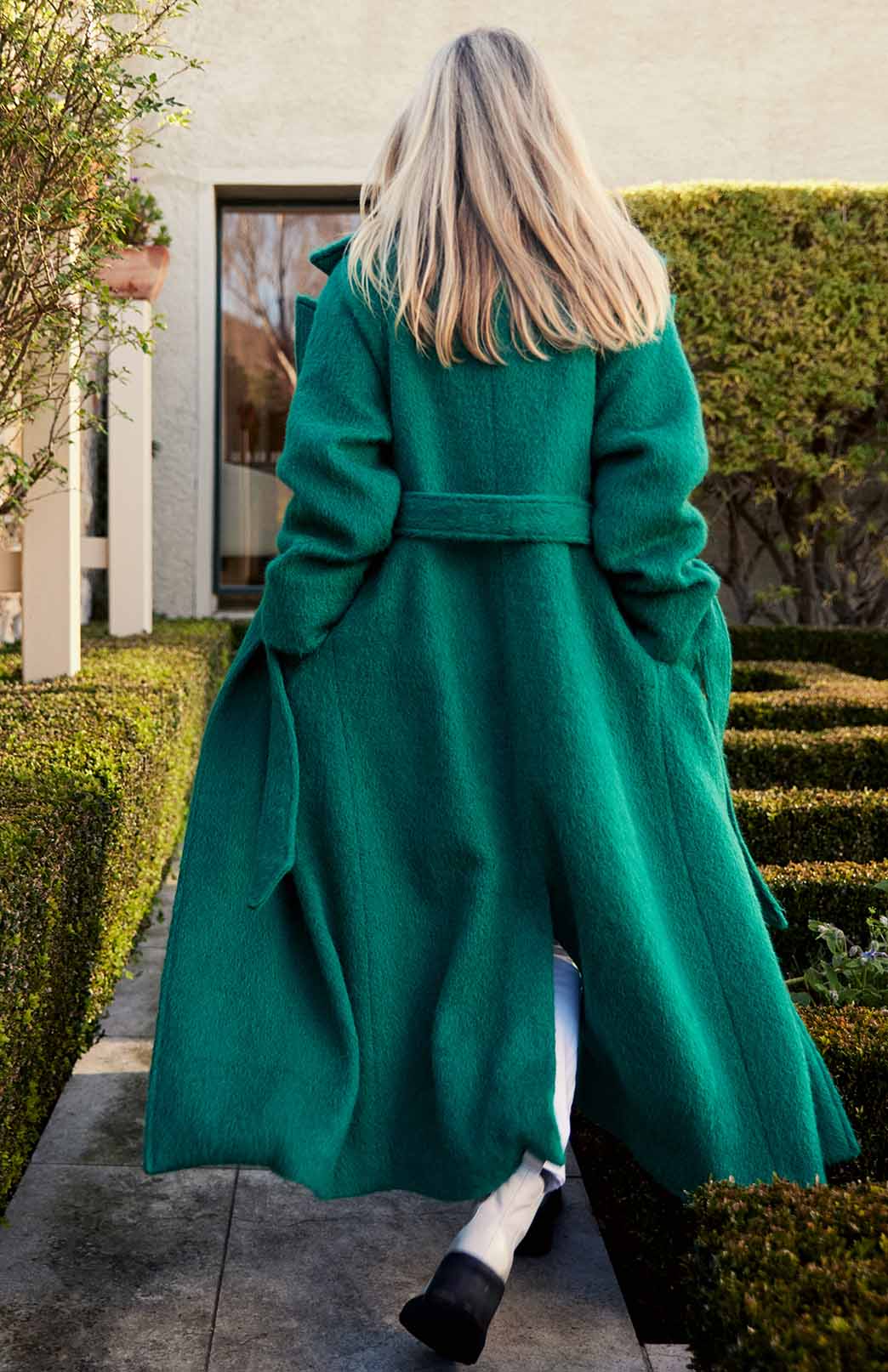 Our model wearing berlin coat, pictured from behind