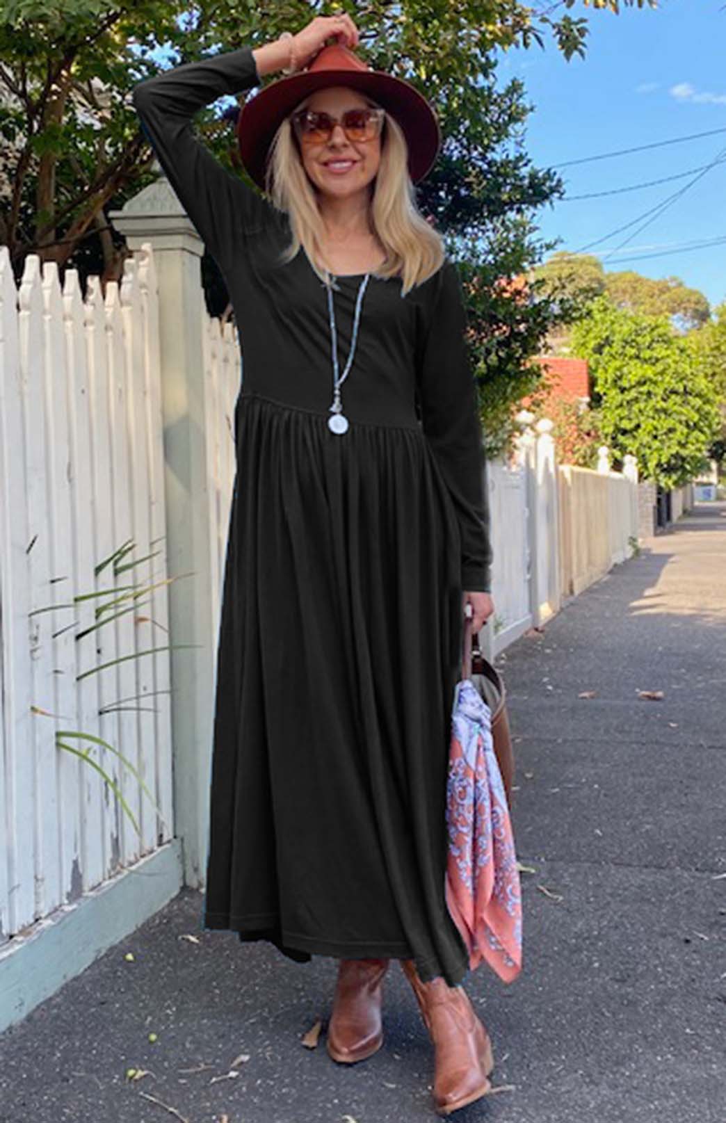 Black Women's scoop neck merino wool long sleeved gathered waist dress with pockets