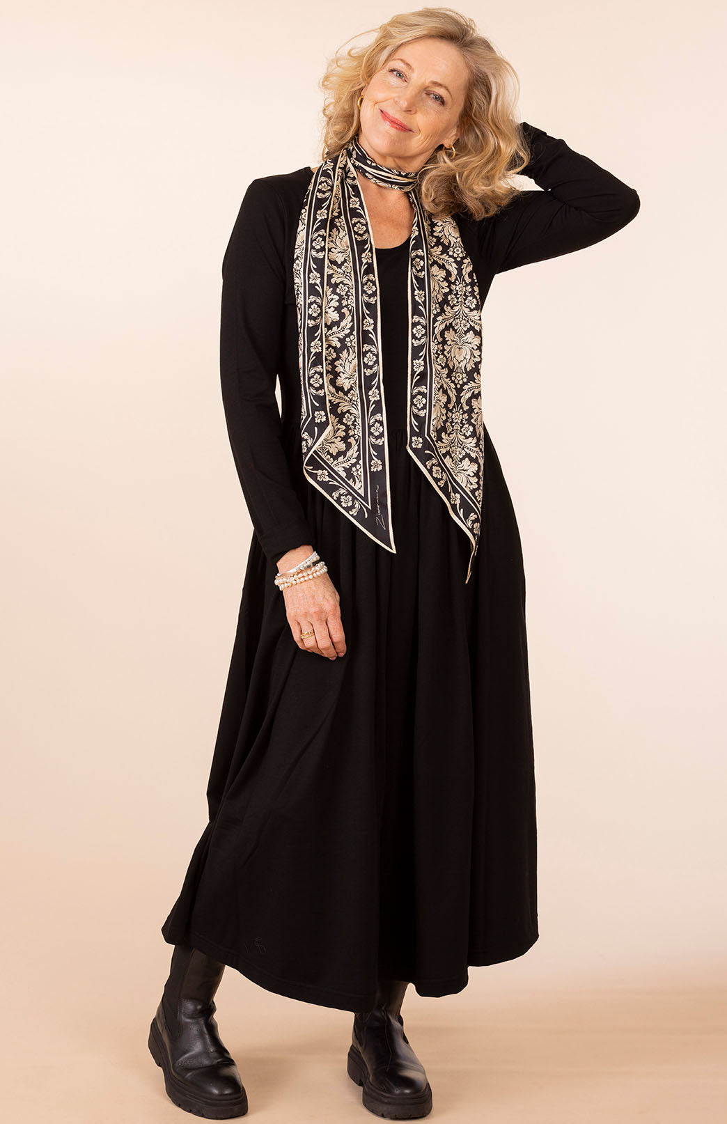 Black Women's scoop neck merino wool long sleeved gathered waist dress with pockets