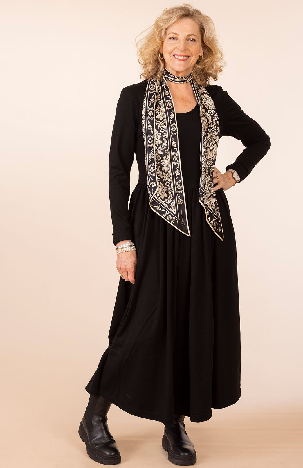 Black Women's scoop neck merino wool long sleeved gathered waist dress with pockets