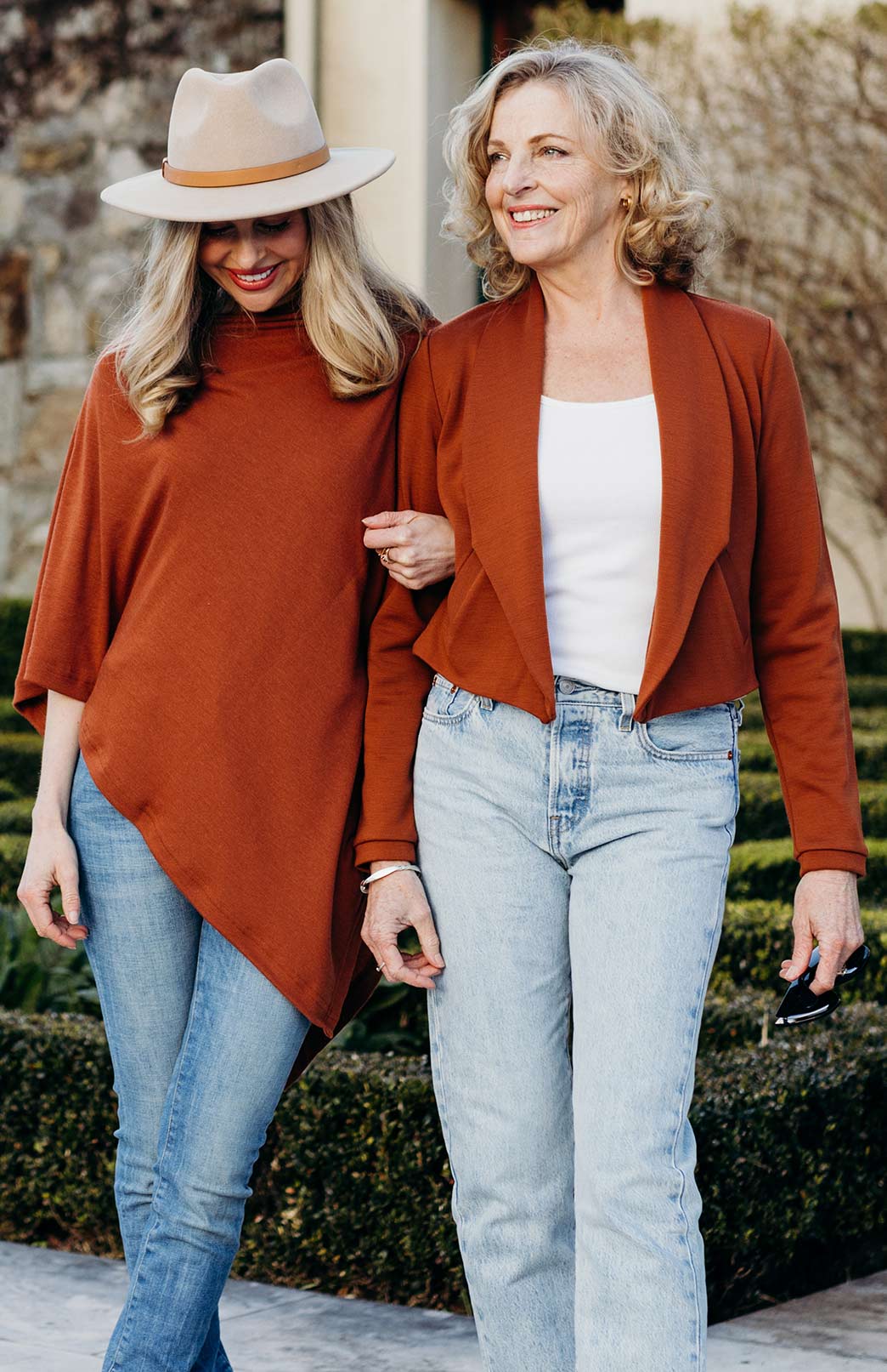Our models wearing classic poncho and lapel jacket