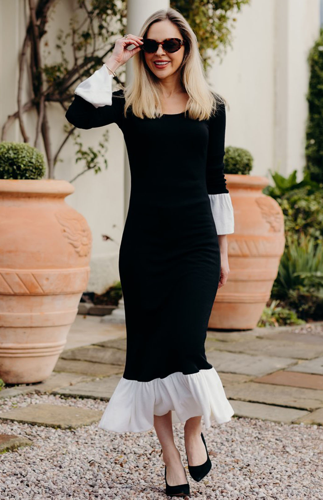 Black & Ivory Women's fitted merino wool dress with long sleeves and ruffle detail