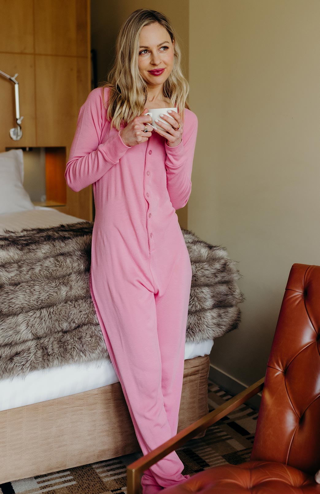 Carnation Pink Merino wool adult button down onesie with elasticated back flap