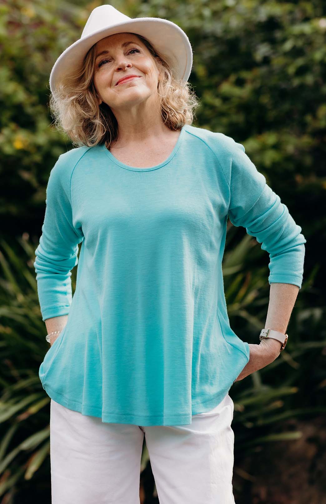 Turquoise Women&#39;s Merino Wool Long Sleeve Top with Raglan Sleeves
